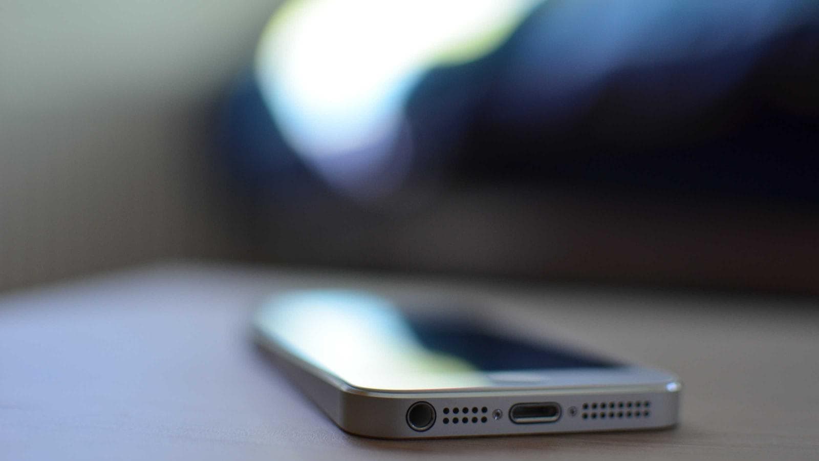 Close-up of a phone on a desk